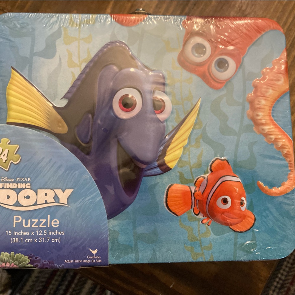 Brand new Dory puzzle in Dory tin!